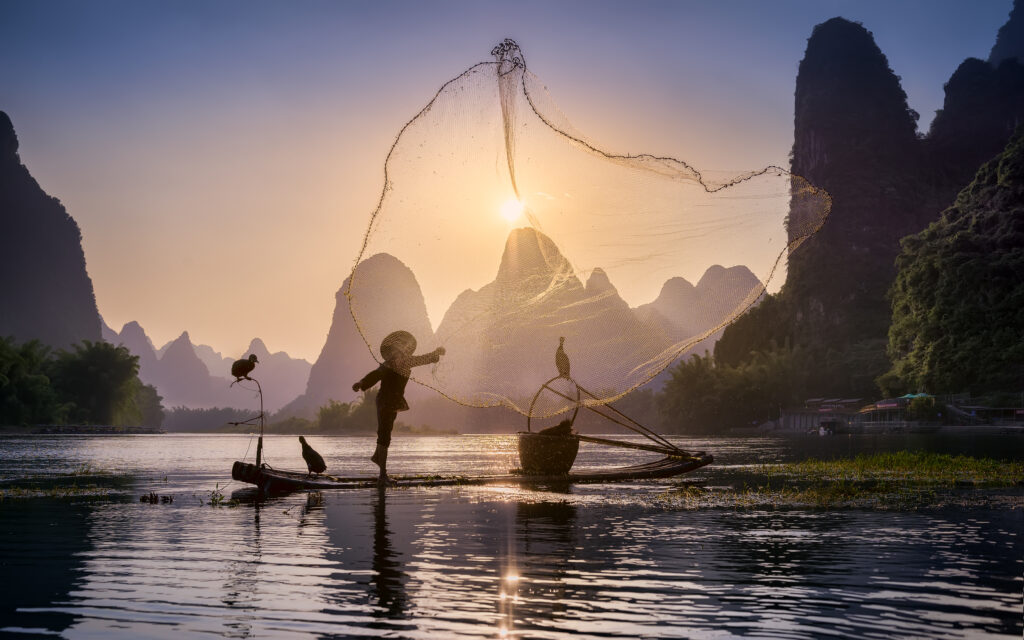Fishing the sun by Jesus M. Garcia,1x.com