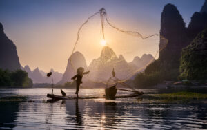 Fishing the sun by Jesus M. Garcia,1x.com